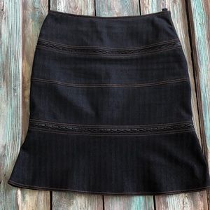 ETCETERA Denim skirt w/ black leather detail.